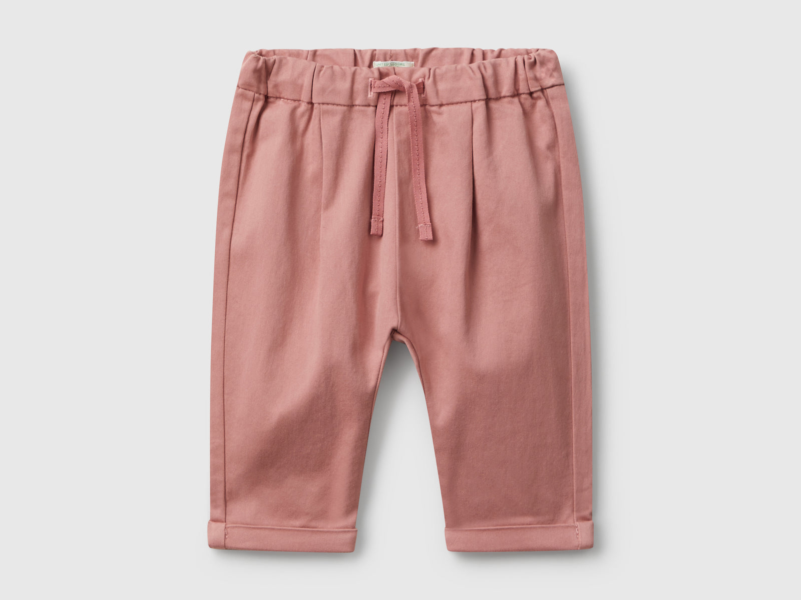 Pantaloni con coulisse da neonato salmone | Benetton Outlet