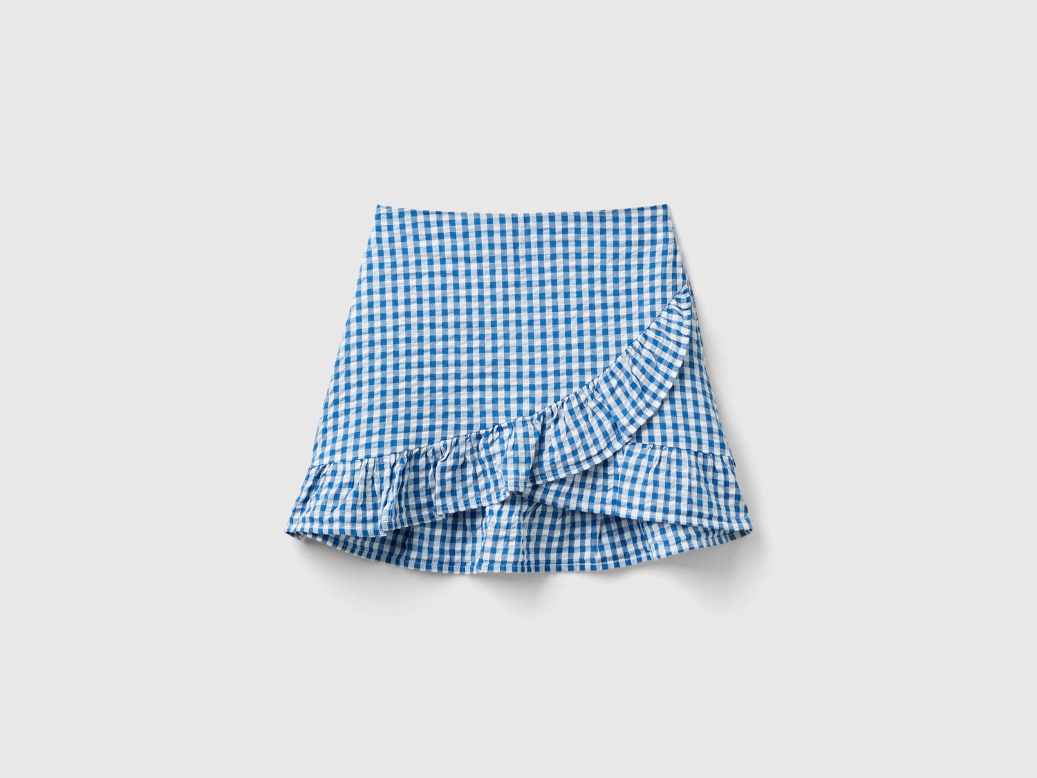 Gonna a portafoglio vichy da bambina blu | Benetton Outlet