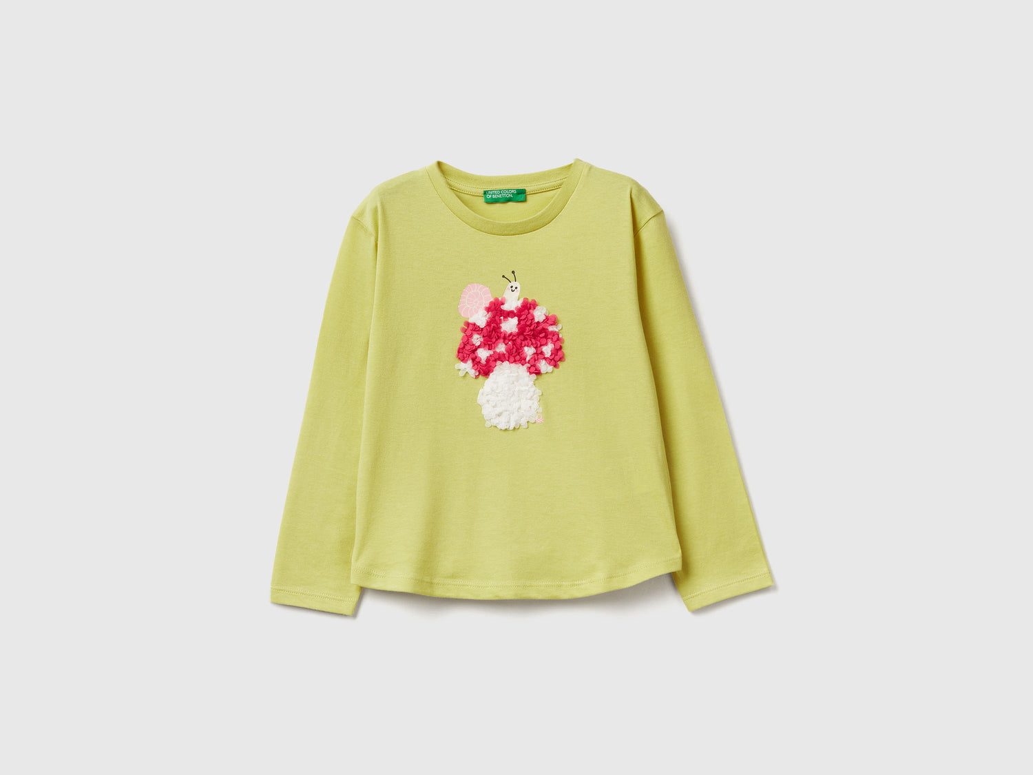 T-shirt con applicazione effetto petali da bimba giallo | Benetton Outlet