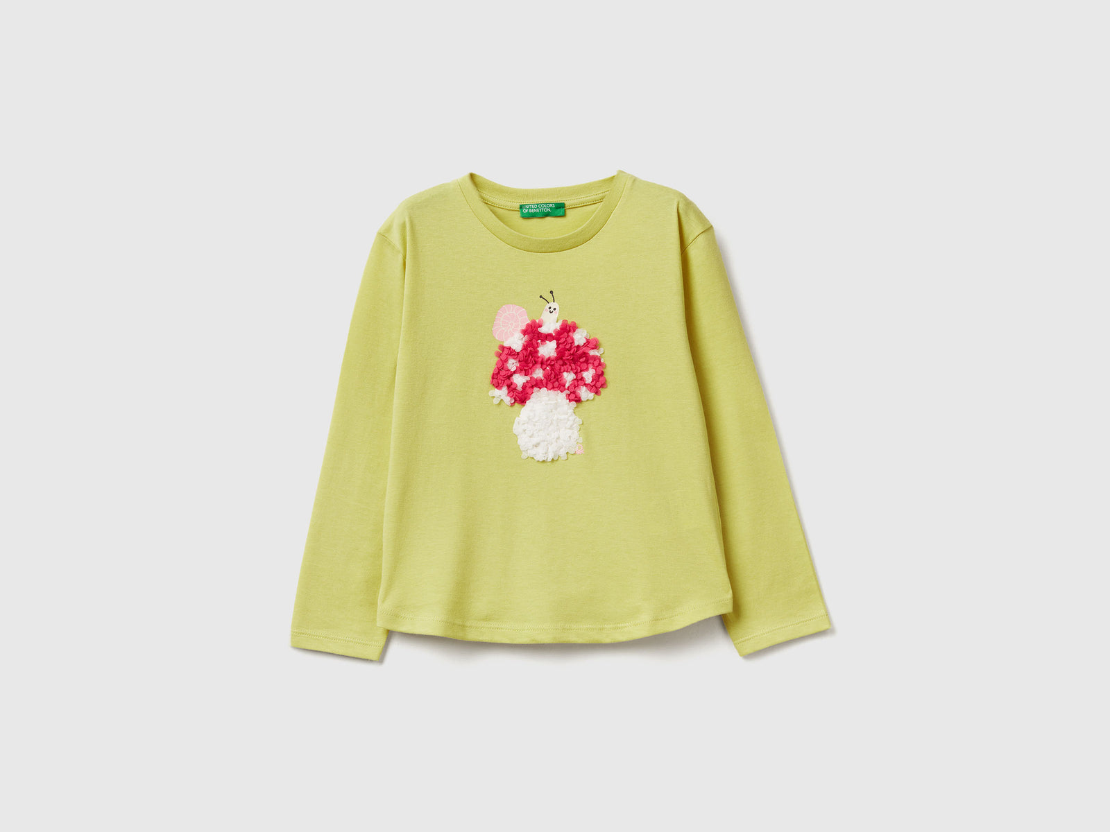 T-shirt con applicazione effetto petali da bimba giallo | Benetton Outlet
