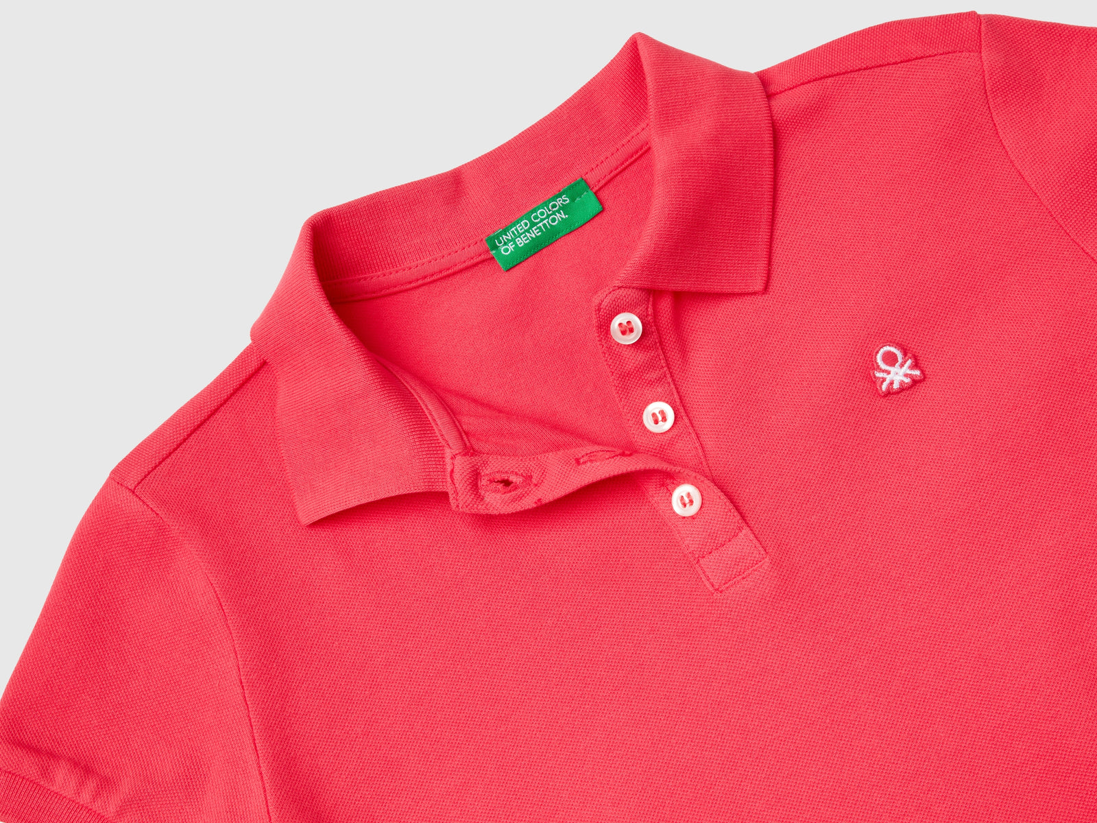 Polo manica corta in cotone bio da bambina fucsia 2 | Benetton Outlet