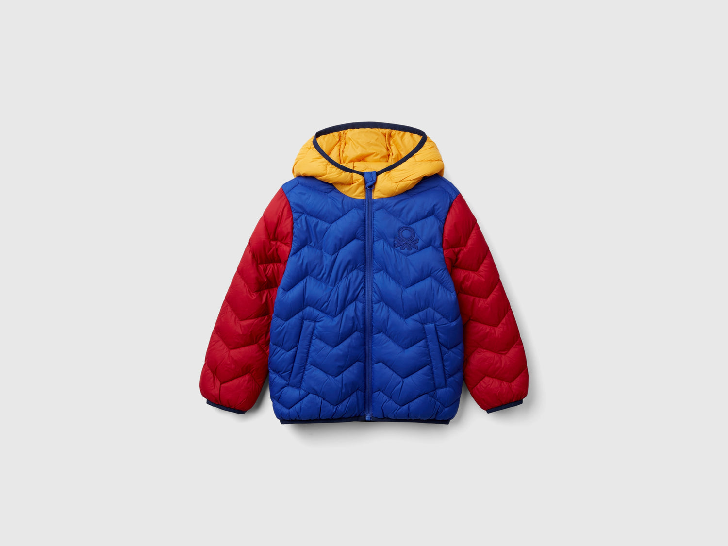 Giubbotto imbottito con cappuccio da bimbo multi-color | Benetton Outlet