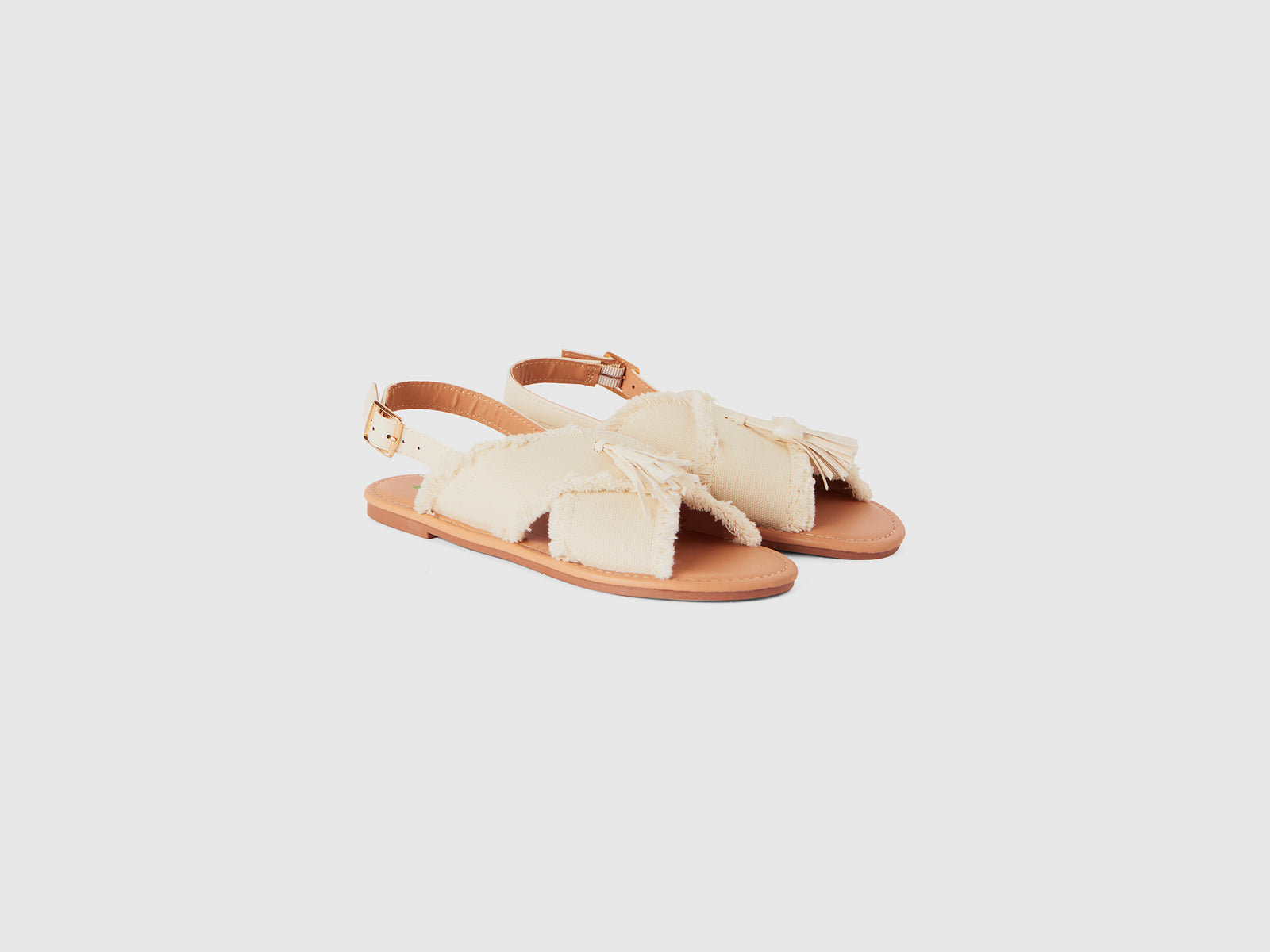 Sandali bassi con nappine da bambina bianco panna 3 | Benetton Outlet