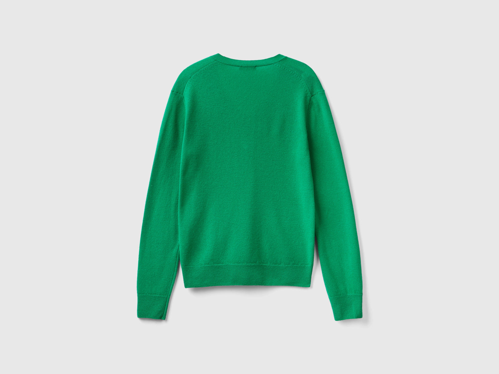 Maglia con scollo a V in pura lana Merino da donna verde 2 | Benetton Outlet