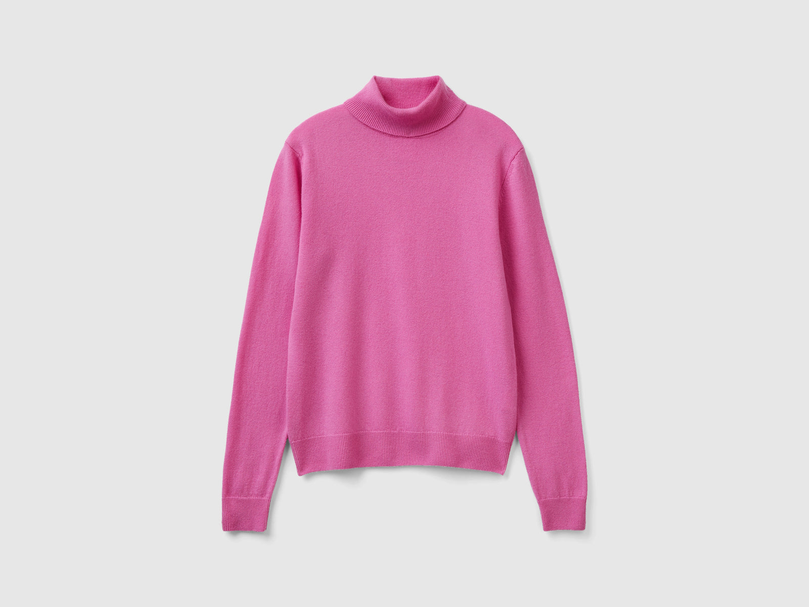 Maglione dolcevita scuro in pura lana Merino da donna rosa | Benetton Outlet