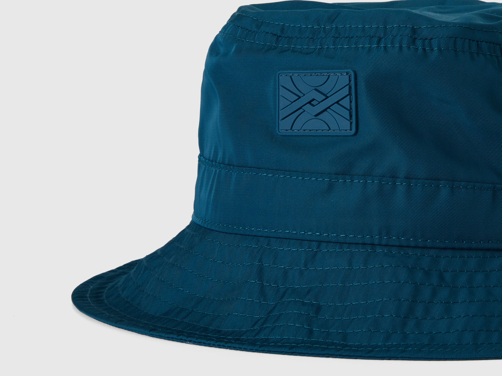 Cappello alla pescatora con coulisse da bambino verde ottanio 3 | Benetton Outlet