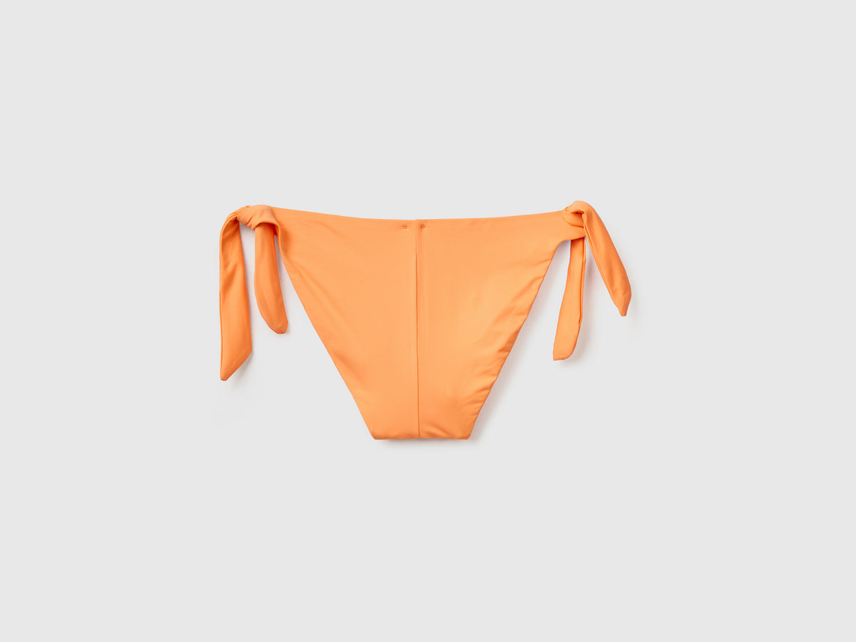 Slip costume con fiocchi laterali