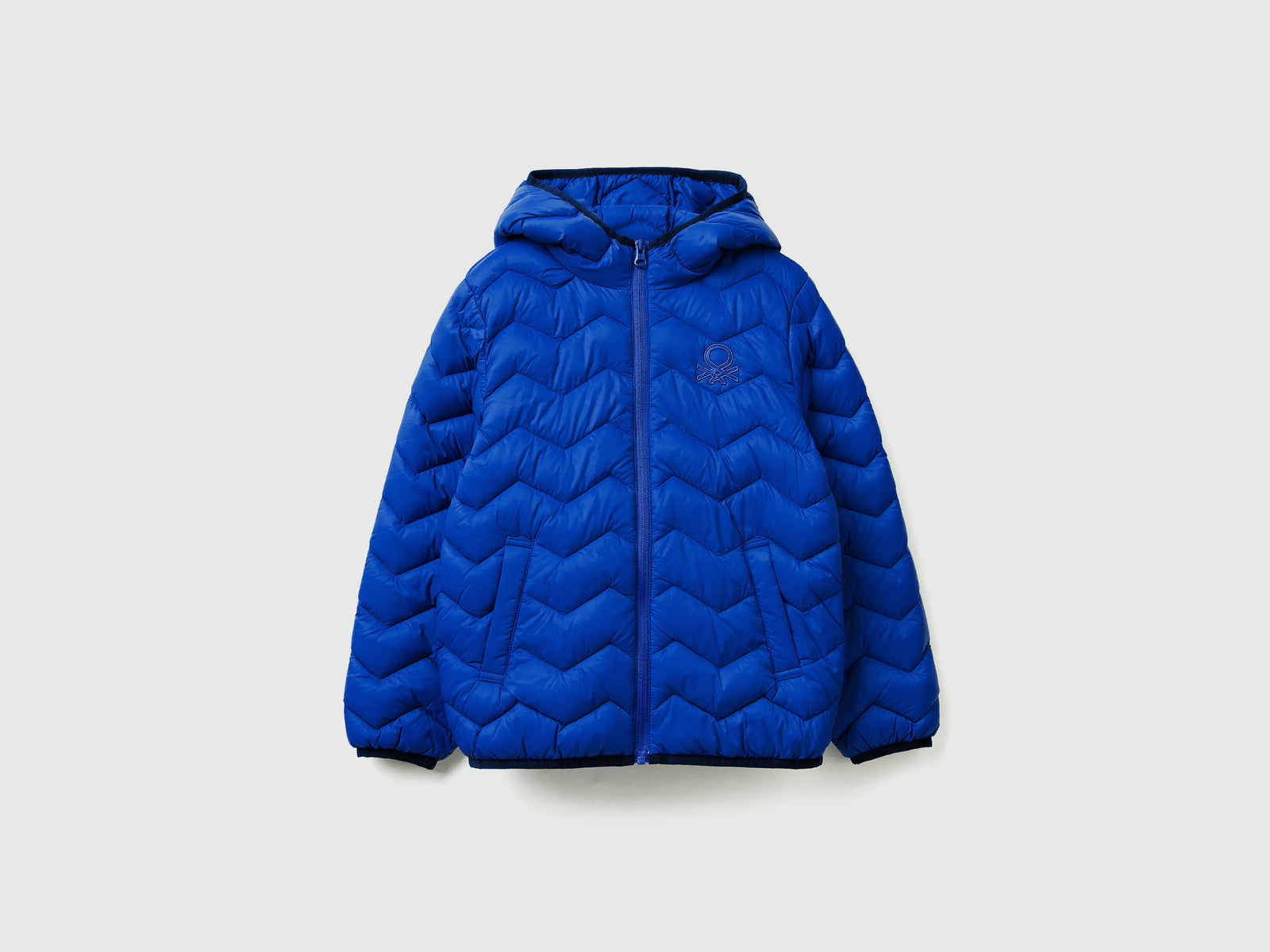 Giubbotto imbottito con cappuccio da bambino bluette | Benetton Outlet