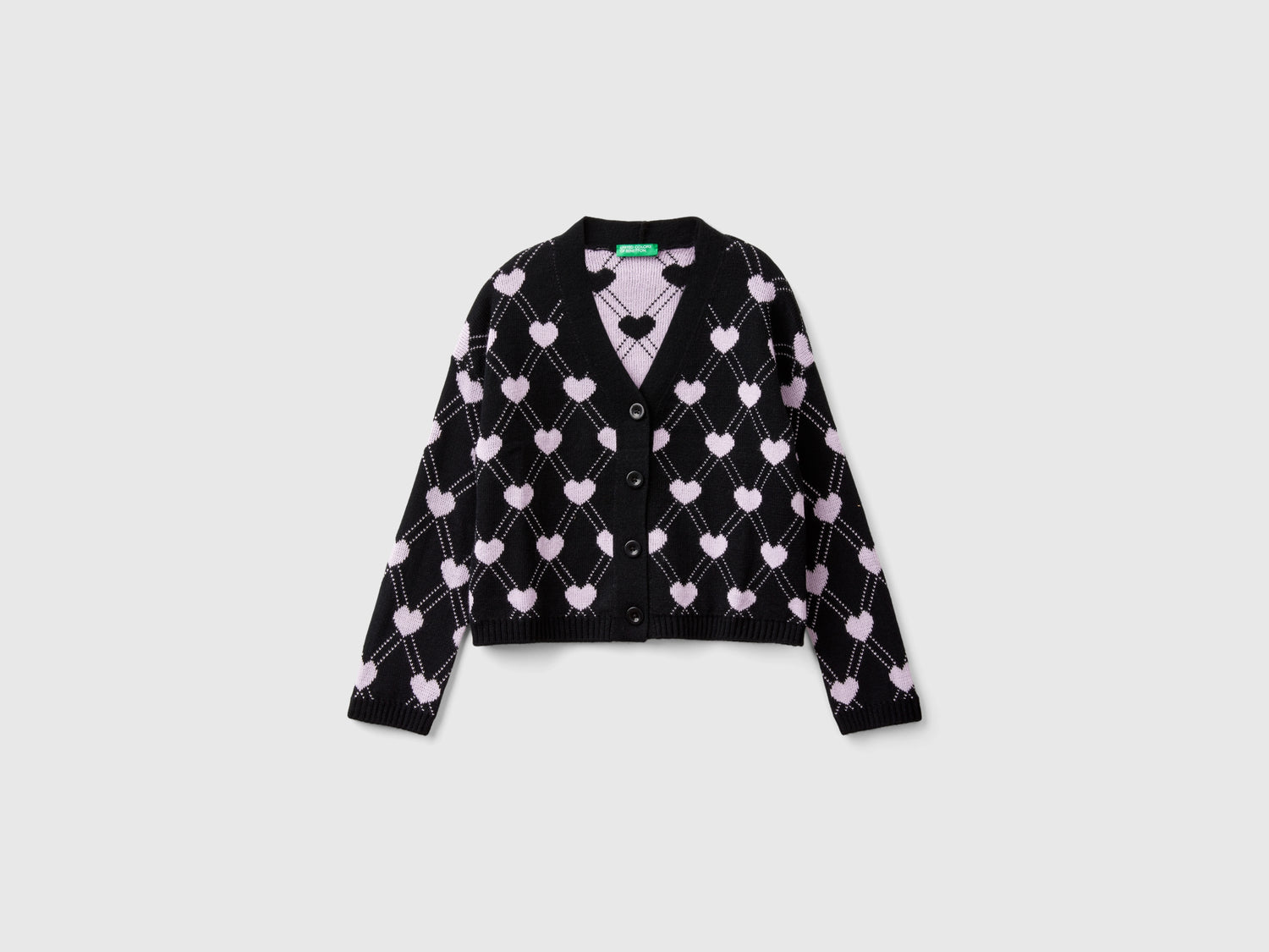Cardigan con motivo cuori da bambina nero | Benetton Outlet