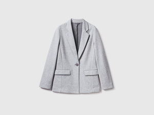 Blazer sciancrato con tasche