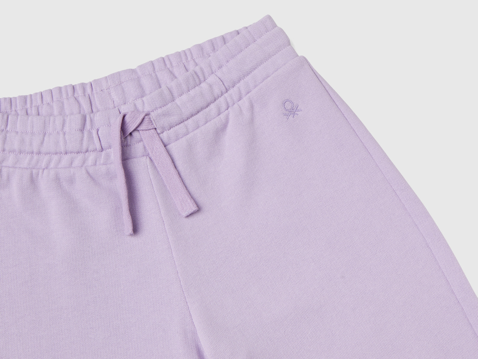 Pantaloni in felpa con logo da bambina lilla 3 | Benetton Outlet