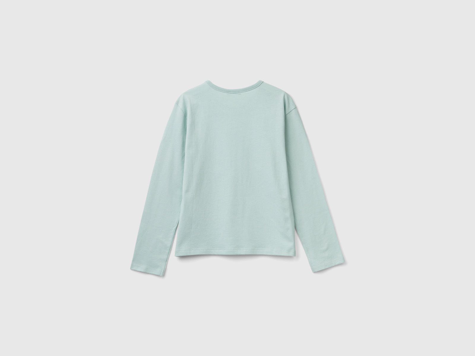T-shirt in caldo cotone bio con paillettes da bambina verde acqua 2 | Benetton Outlet