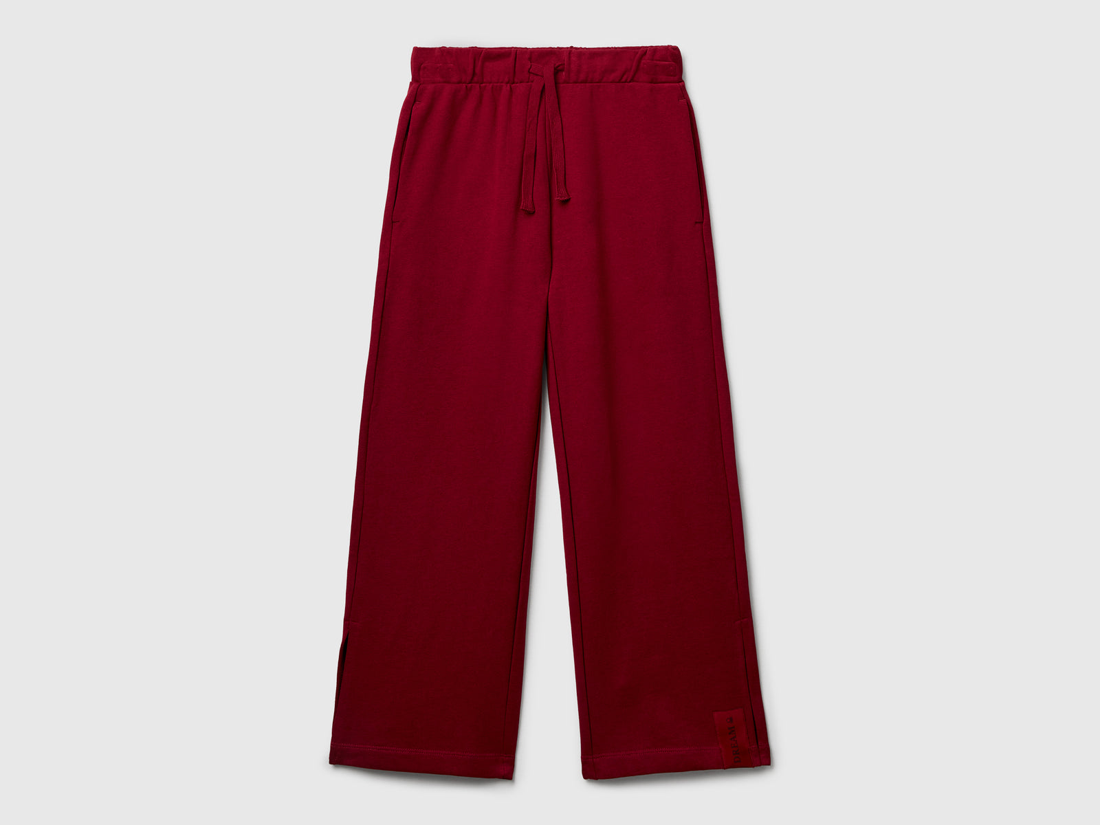 Pantaloni ampi in felpa da bambina bordeaux | Benetton Outlet