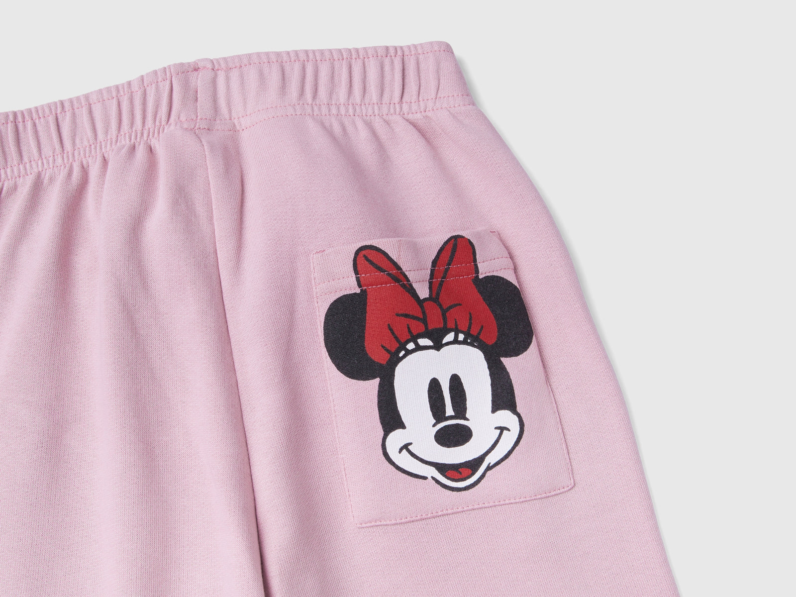 Joggers con stampa Minnie da bambino rosa 2 | Benetton Outlet