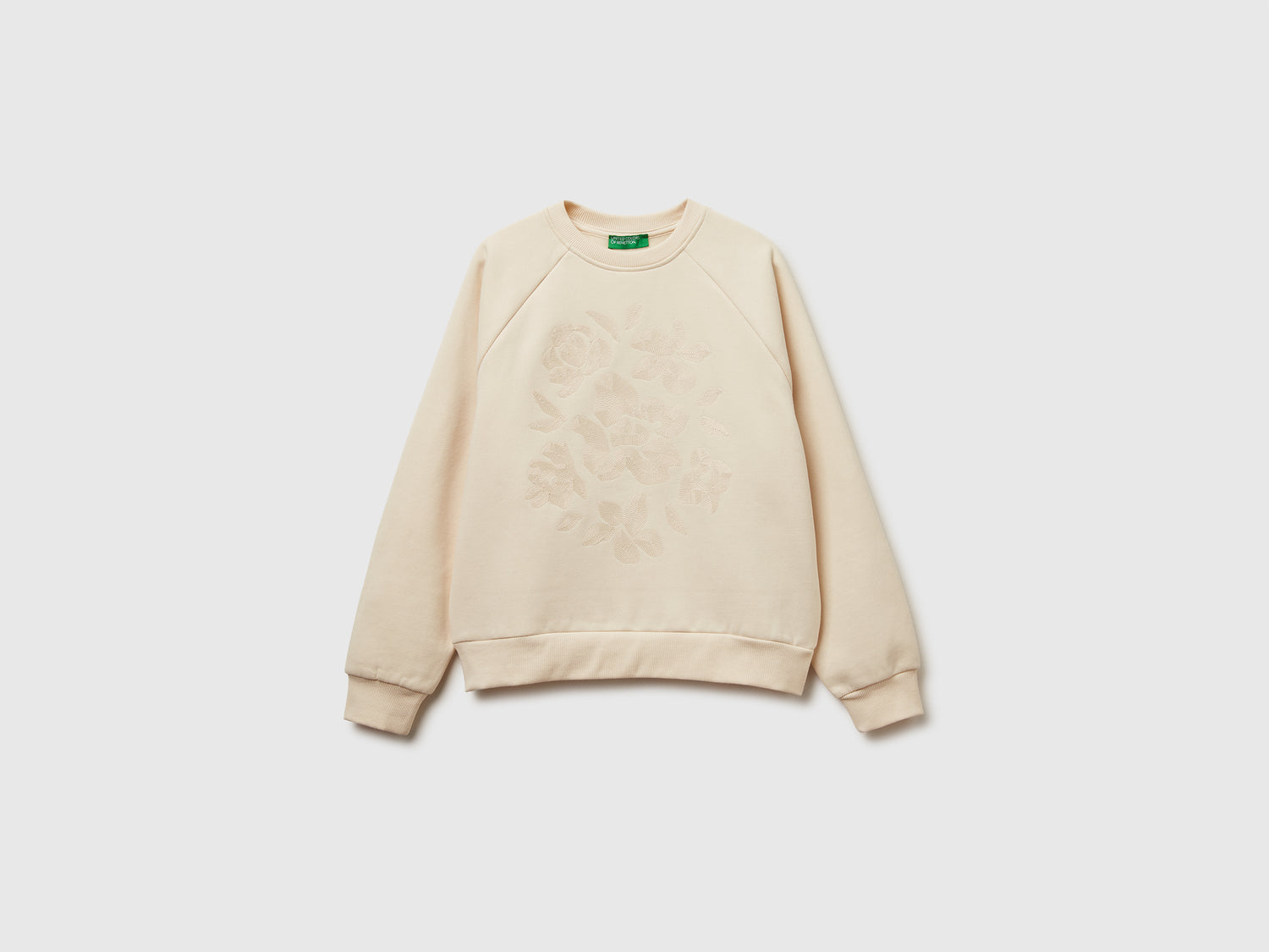 Calda felpa regular fit con ricamo fiori da donna bianco panna | Benetton Outlet