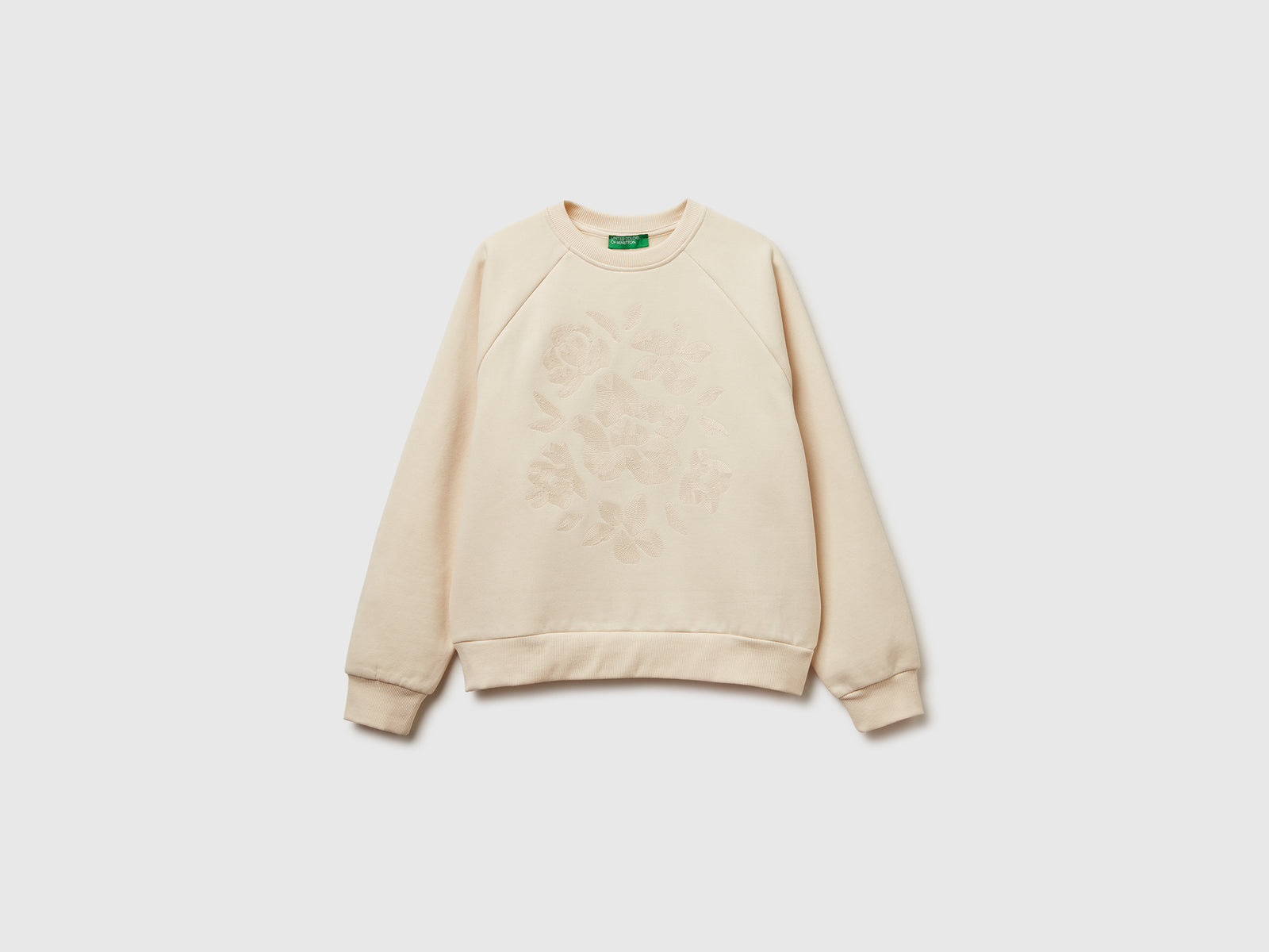 Calda felpa regular fit con ricamo fiori da donna bianco panna | Benetton Outlet