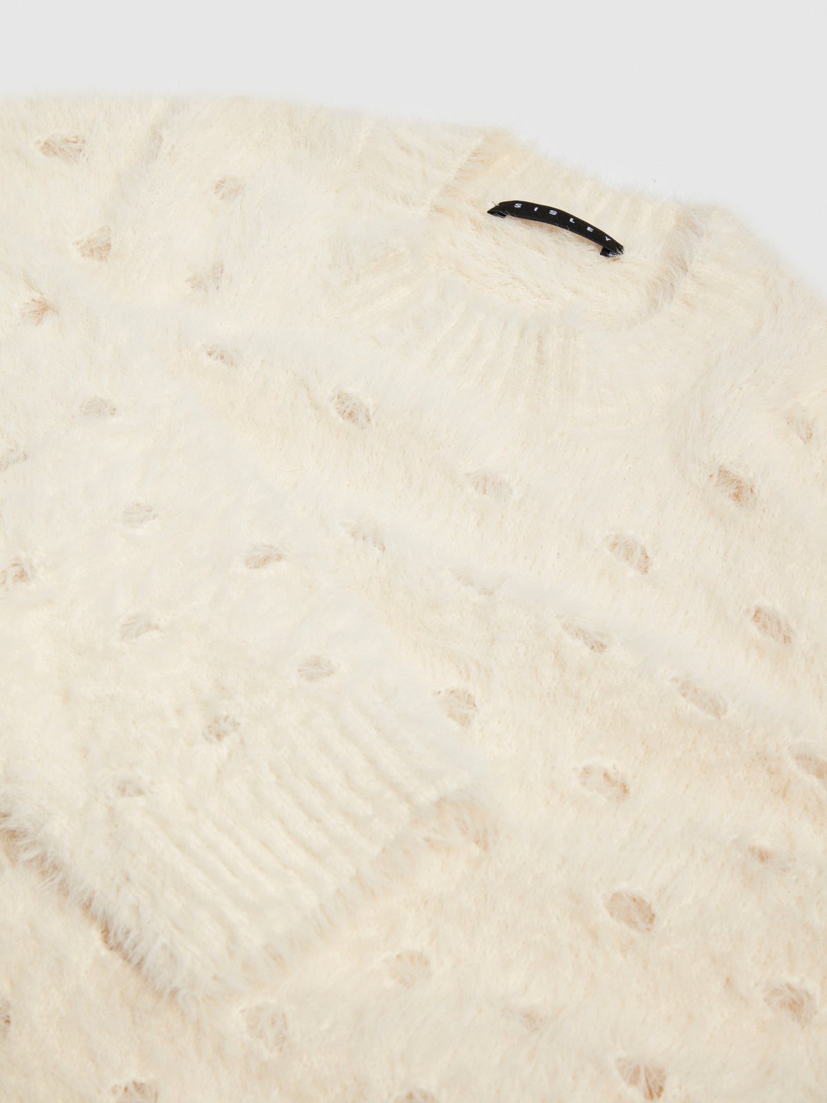 Maglia fluffy traforata