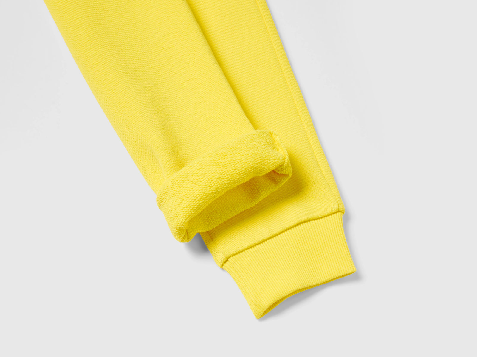 Pantaloni sportivi con coulisse da bambino giallo 3 | Benetton Outlet