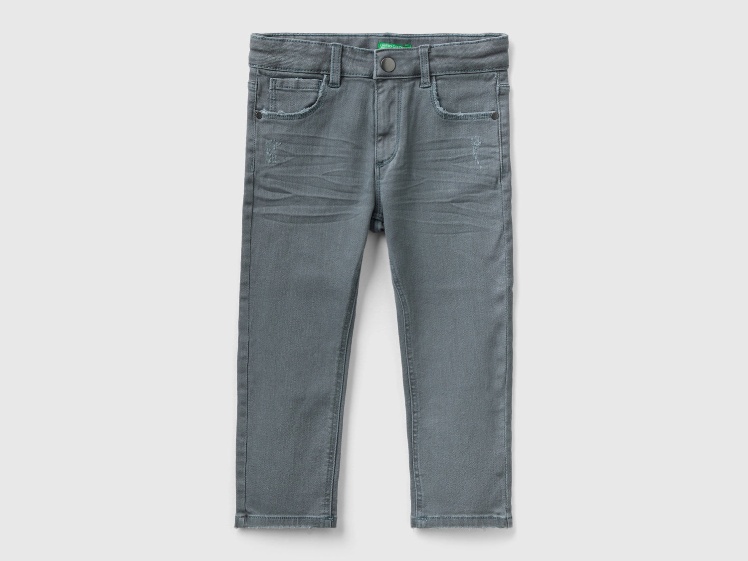 Jeans con piccole rotture da bimbo grigio scuro | Benetton Outlet