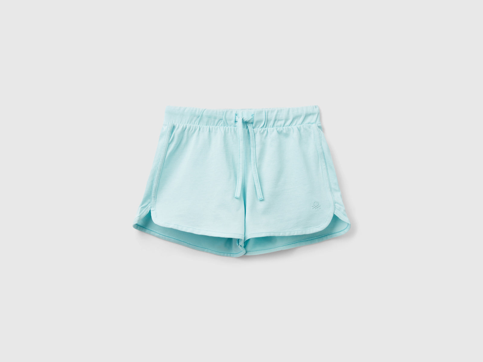 Shorts stile runner in cotone bio da bambina verde acqua | Benetton Outlet