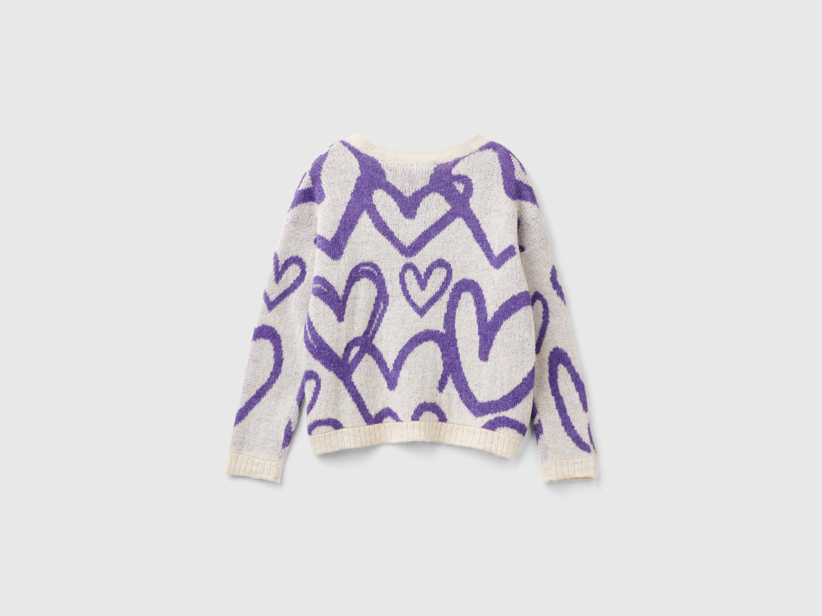 Maglioncino con motivo cuori jacquard da bambina bianco panna 2 | Benetton Outlet