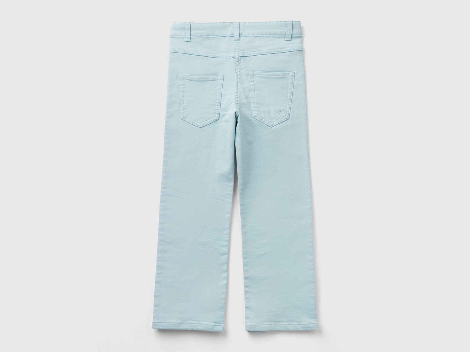 Pantaloni a zampa stretch da bambina azzurro 2 | Benetton Outlet
