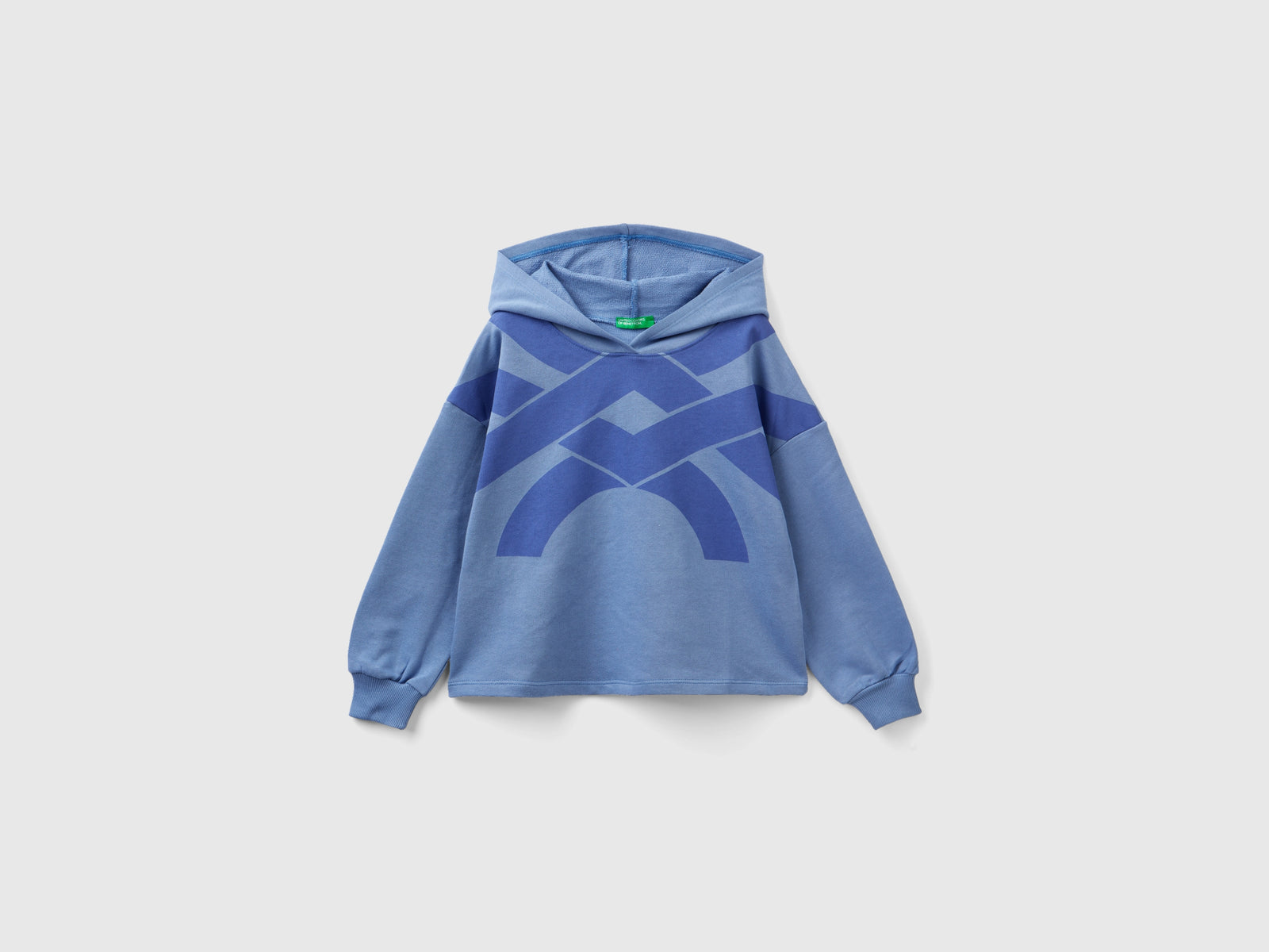 Felpa over fit con cappuccio da bambina azzurro | Benetton Outlet