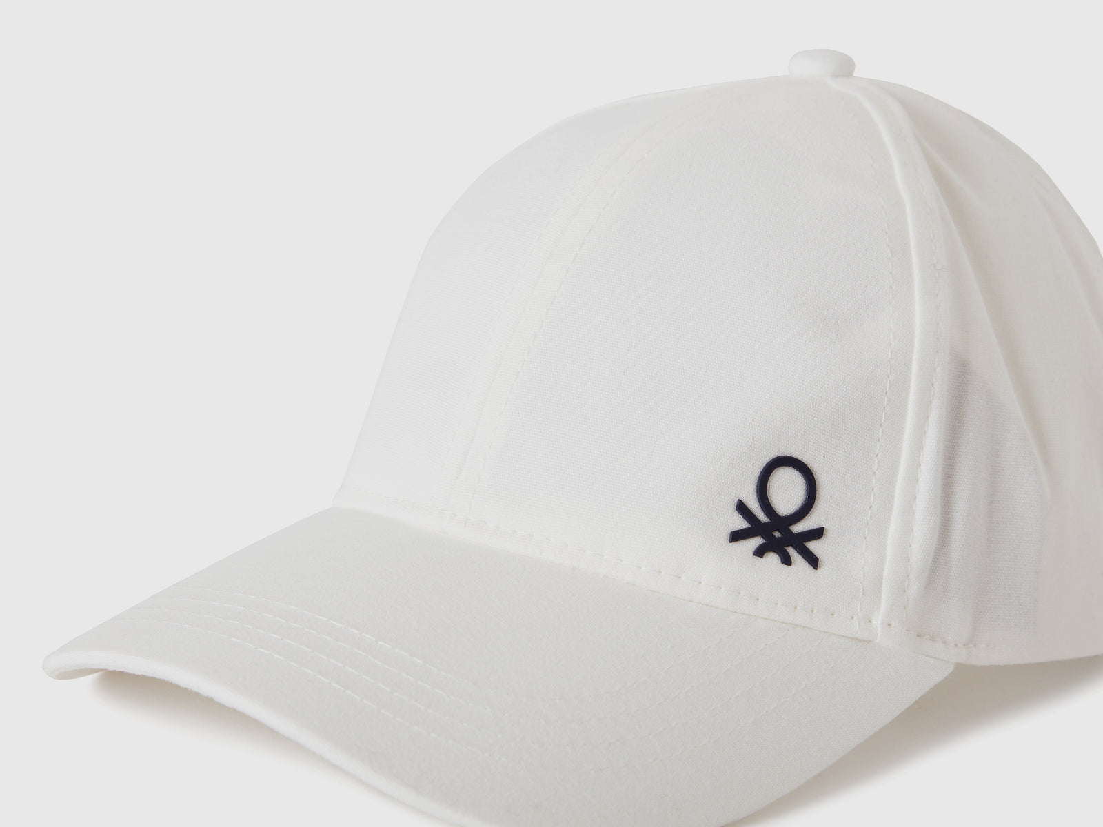Cappellino con visiera da bambino bianco 3 | Benetton Outlet