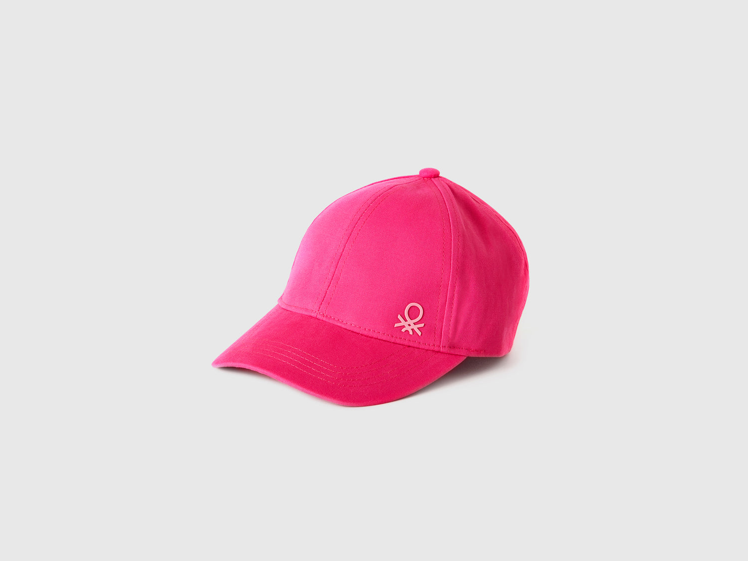 Cappellino con visiera da bimbo fucsia | Benetton Outlet