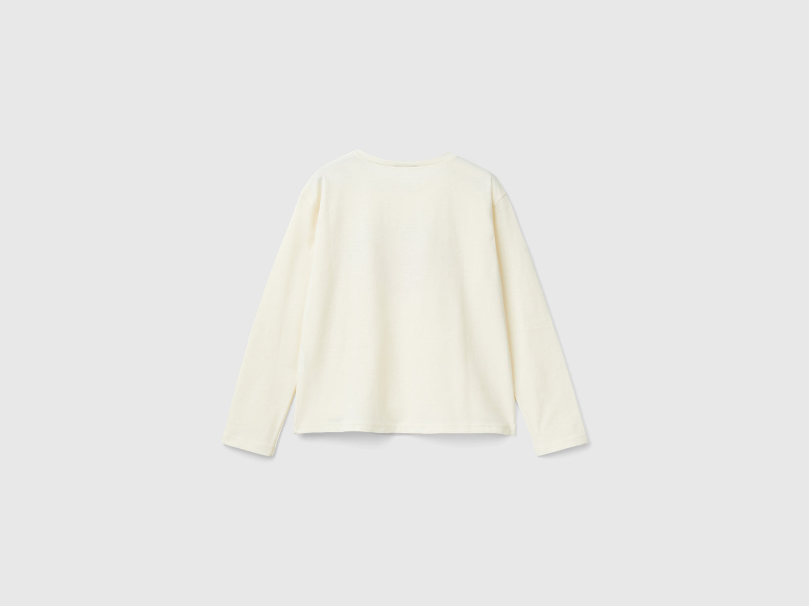 T-shirt con stampa glitter da bambina bianco panna 2 | Benetton Outlet