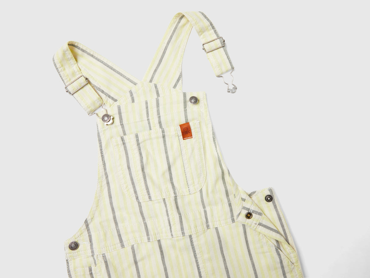 Salopette a righe con tasche