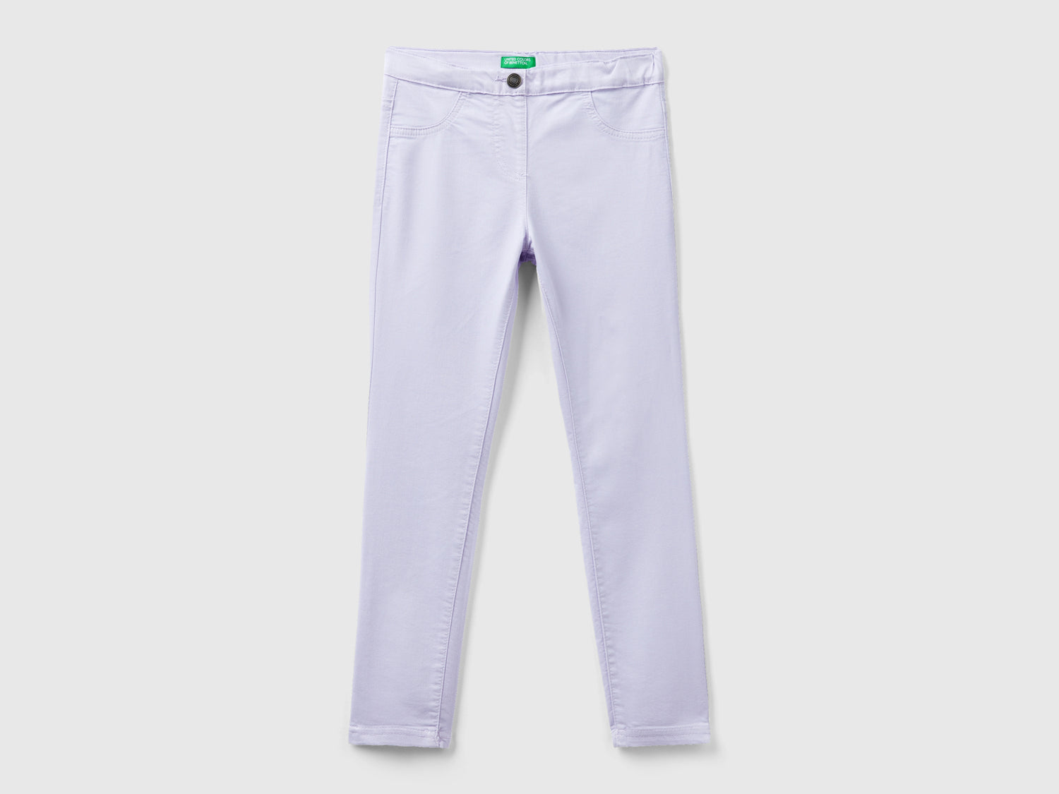 Pantaloni super skinny da bambina lilla | Benetton Outlet