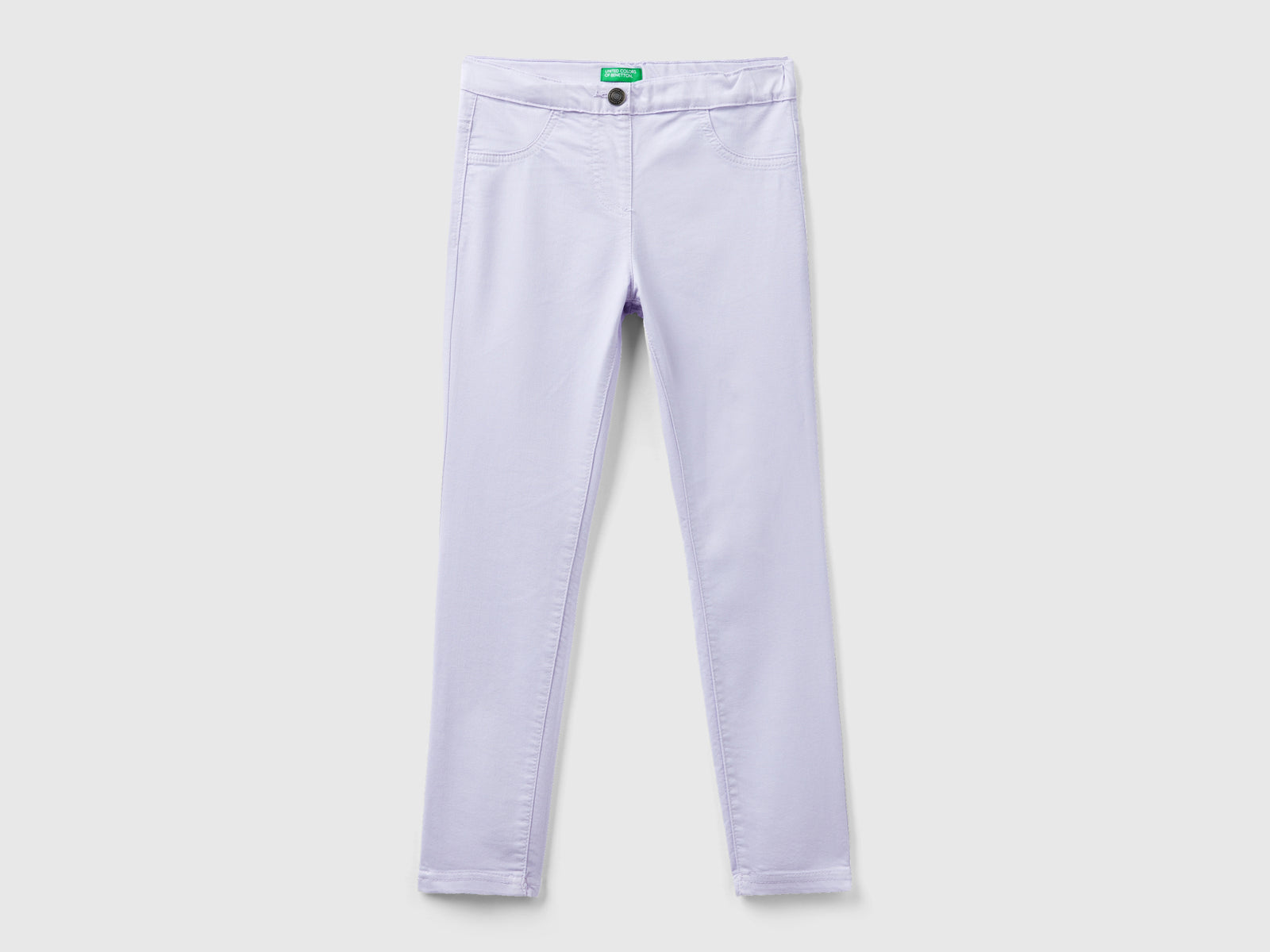 Pantaloni super skinny da bambina lilla | Benetton Outlet