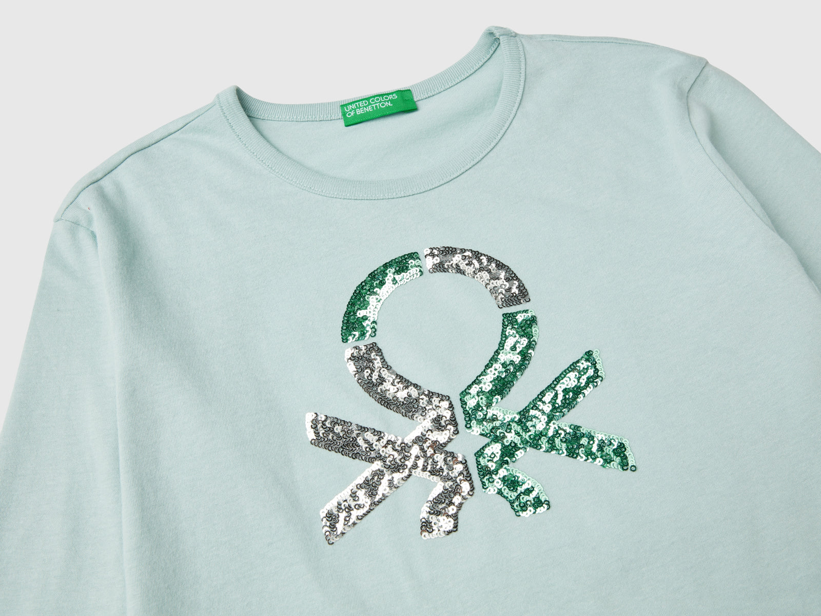 T-shirt in caldo cotone bio con paillettes da bambina verde acqua 3 | Benetton Outlet