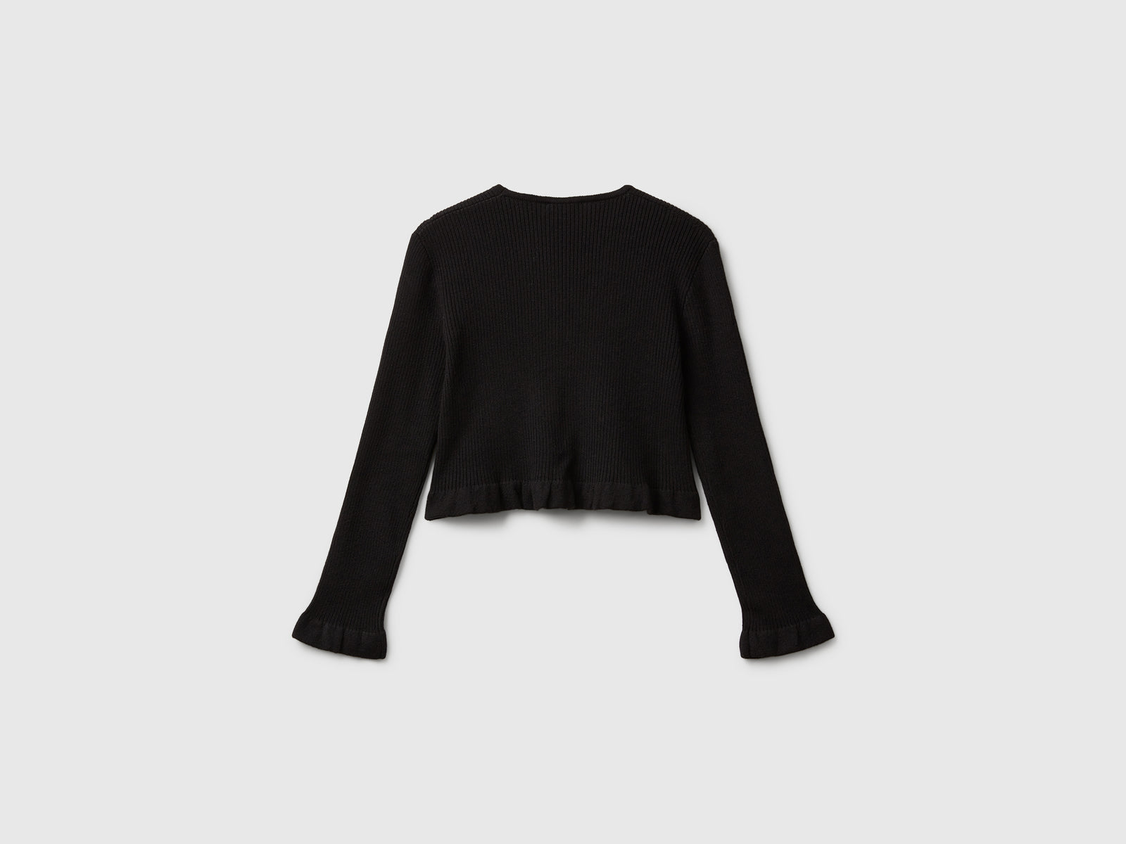 Cardigan con bottoni cuoricino da bambina nero 2 | Benetton Outlet