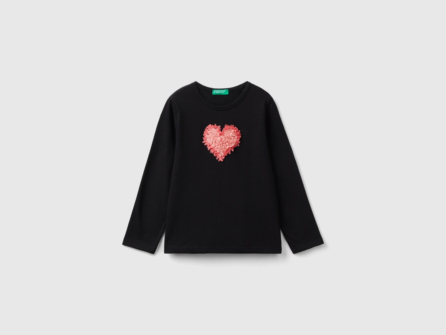 T-shirt con applicazione effetto petali da bimba nero | Benetton Outlet
