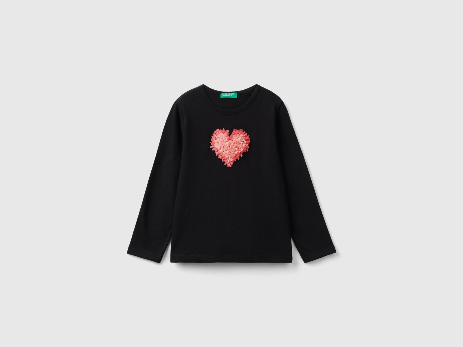T-shirt con applicazione effetto petali da bimba nero | Benetton Outlet