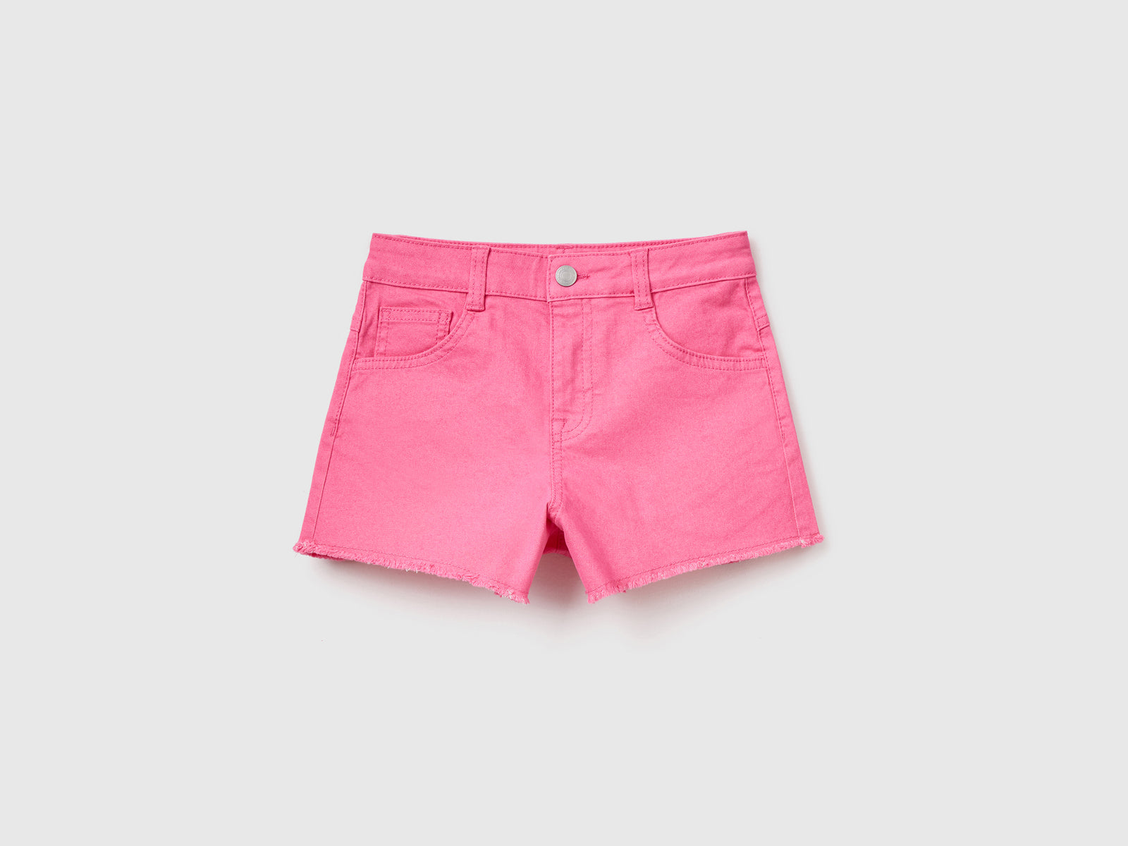 Pantaloni corti cinque tasche in misto cotone elasticizzato da bambina rosa | Benetton Outlet