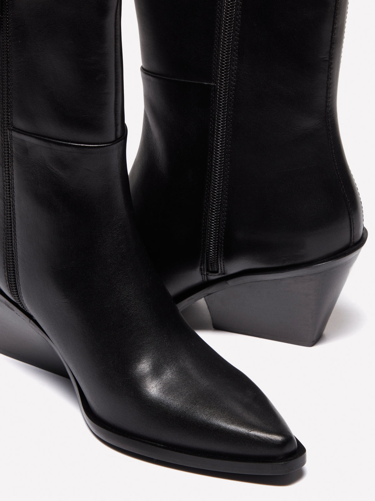 Botines de piel tejana