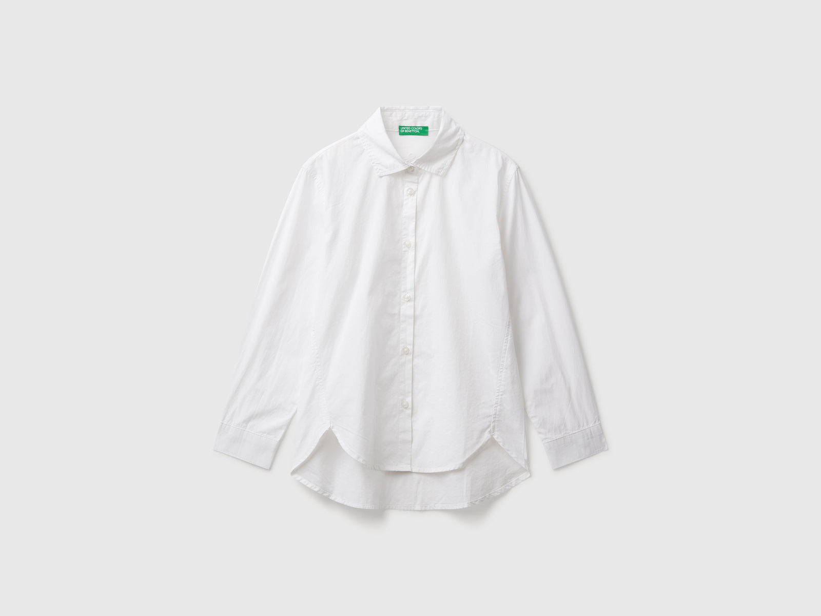 Camicia over fit da bambina bianco | Benetton Outlet