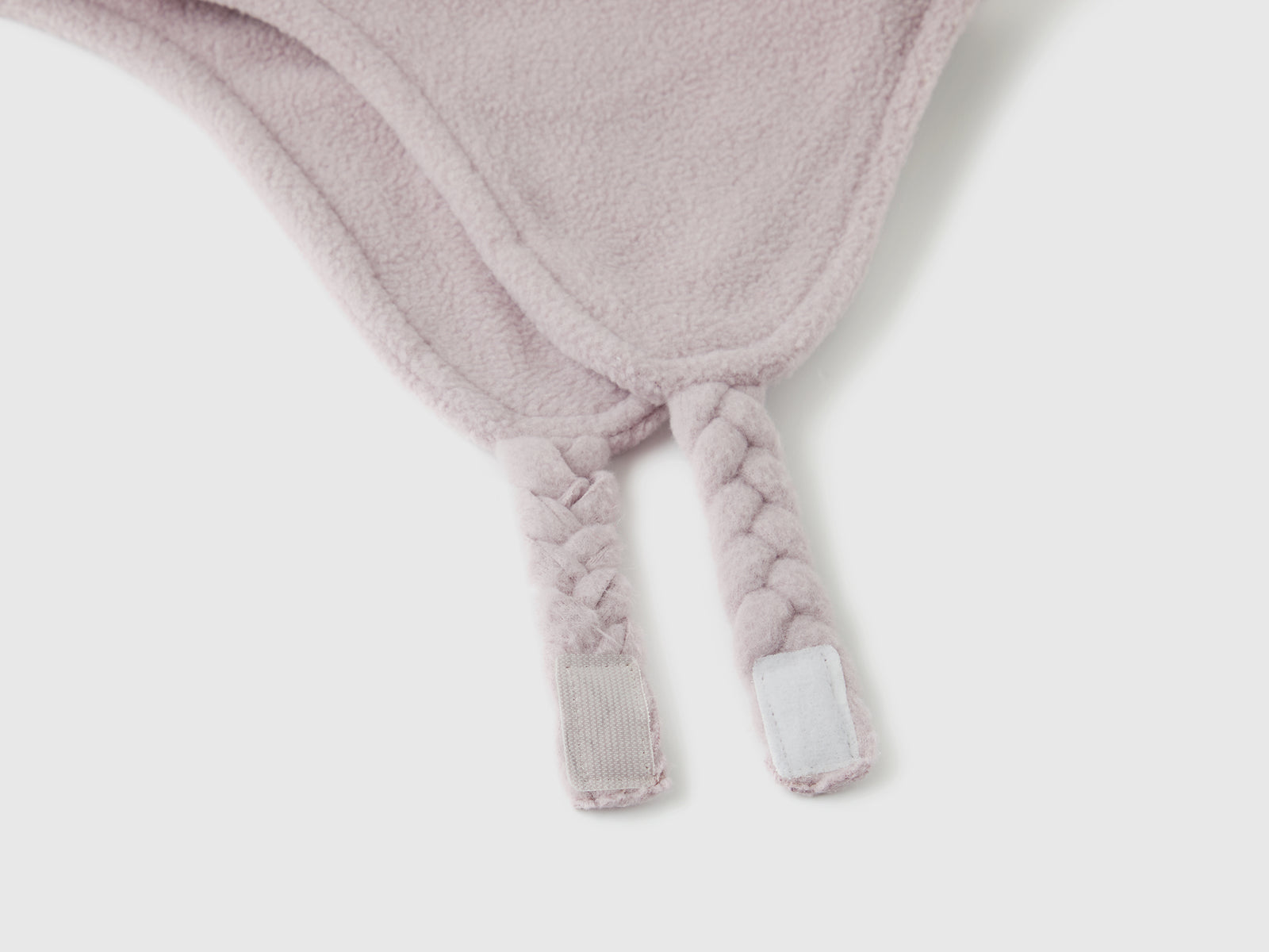 Cappello con paraorecchie e pom pom da bimbo rosa 2 | Benetton Outlet