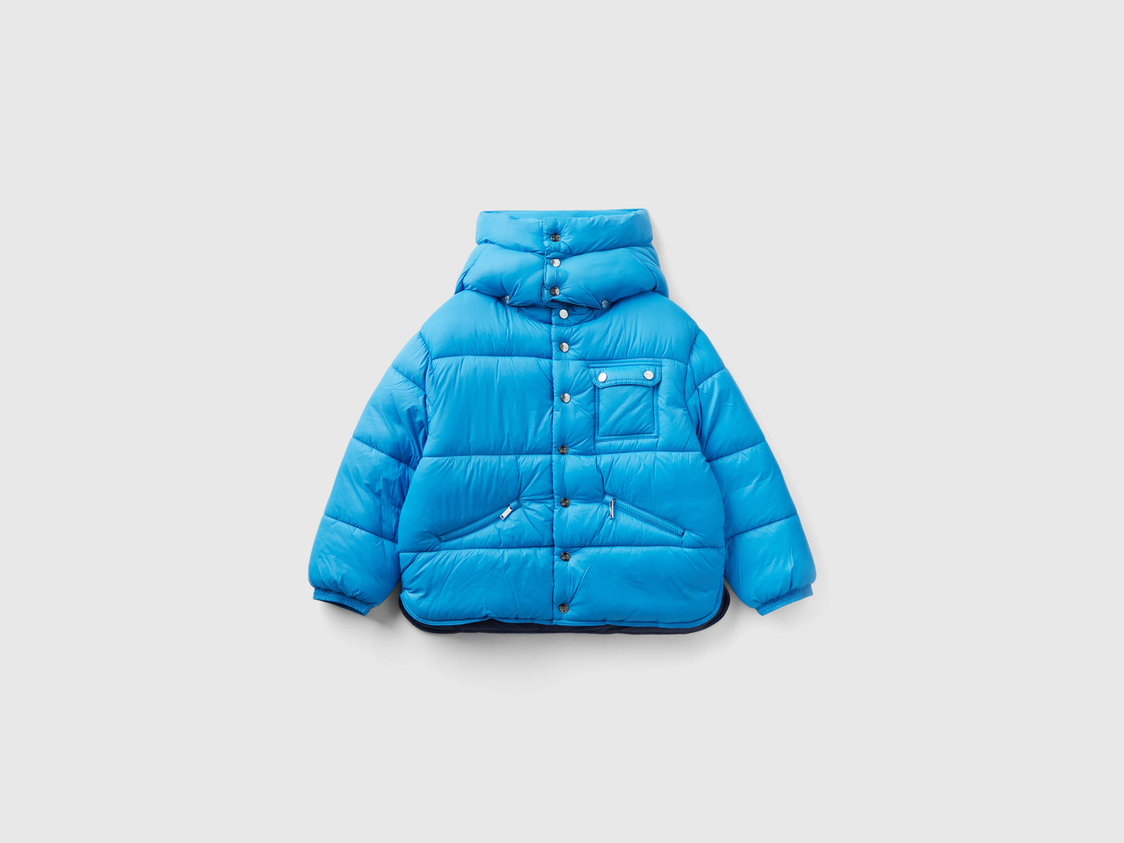 Piumino con cappuccio staccabile da bambino azzurro | Benetton Outlet