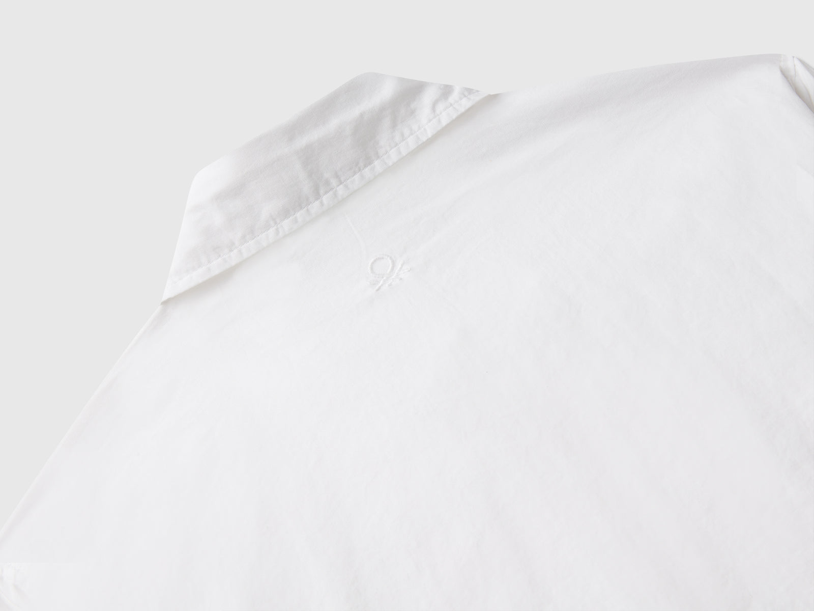 Camicia over fit da bambina bianco 3 | Benetton Outlet