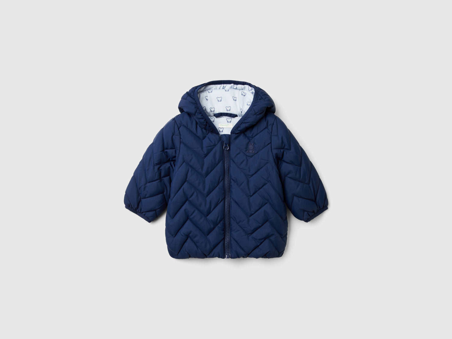 Piumino imbottito con orecchie da neonato blu scuro | Benetton Outlet