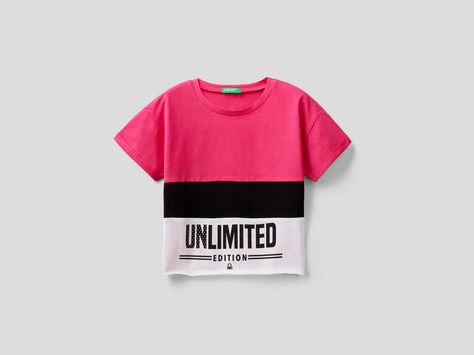 Maglietta cropped con stampa da bambina fucsia | Benetton Outlet