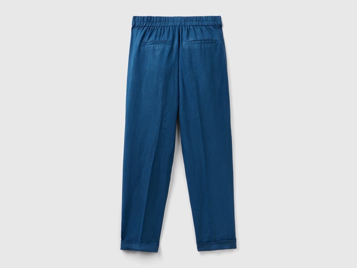 Pantaloni lunghi in puro lino con taglio cropped e gamba affusolata