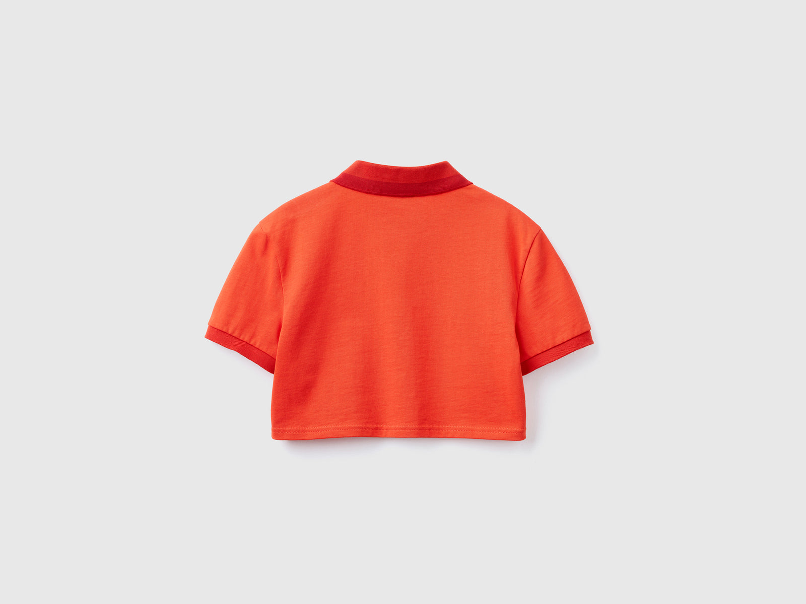 Polo cropped con ricamo frutta da donna rosso 2 | Benetton Outlet