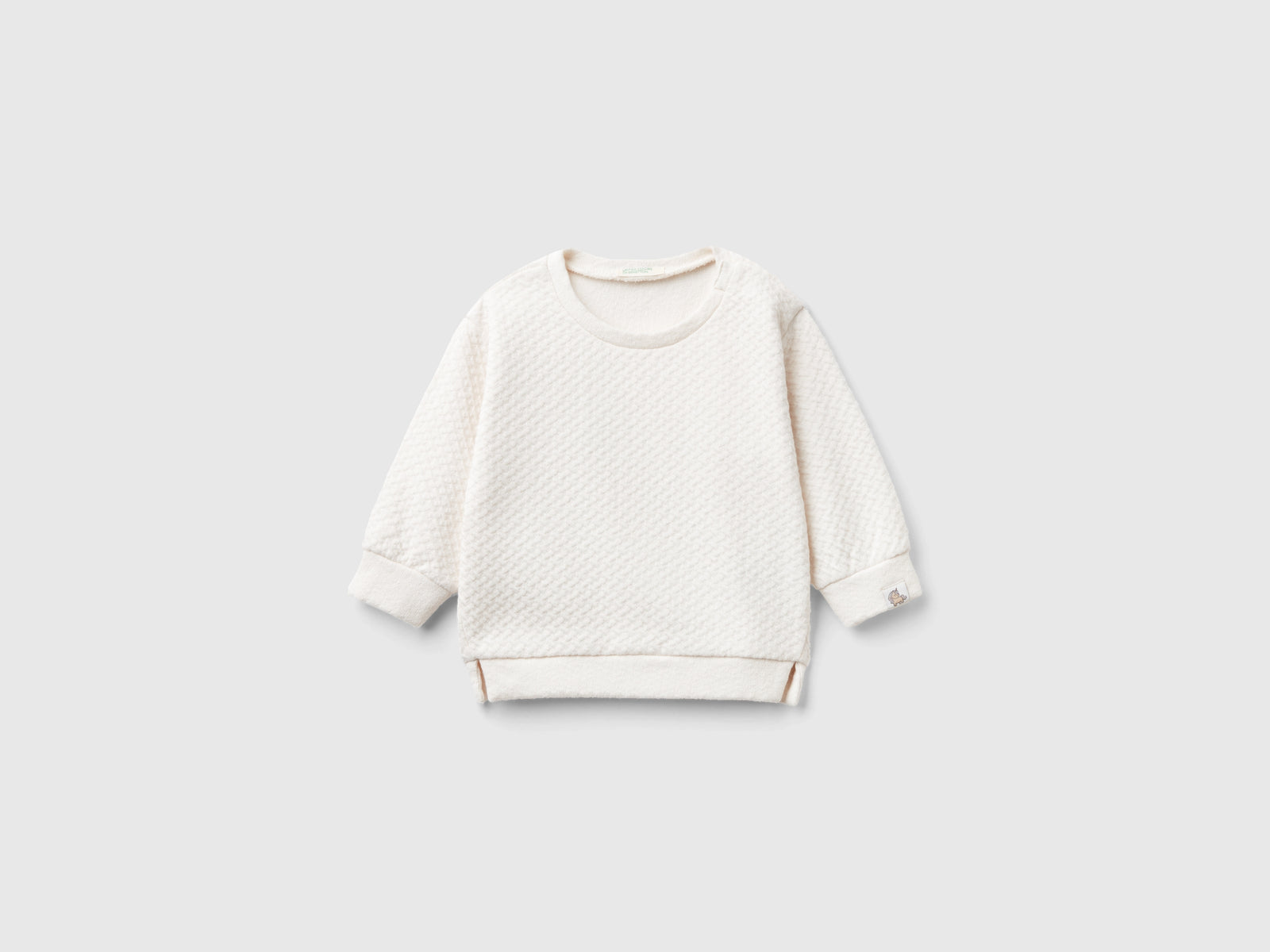 Felpa chiusa jacquard da neonato bianco panna | Benetton Outlet