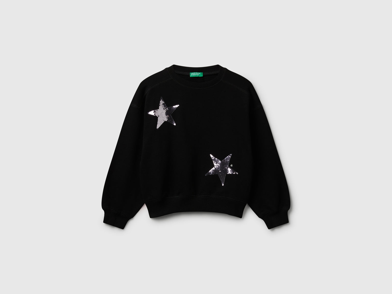 Felpa con paillettes da bambina nero | Benetton Outlet