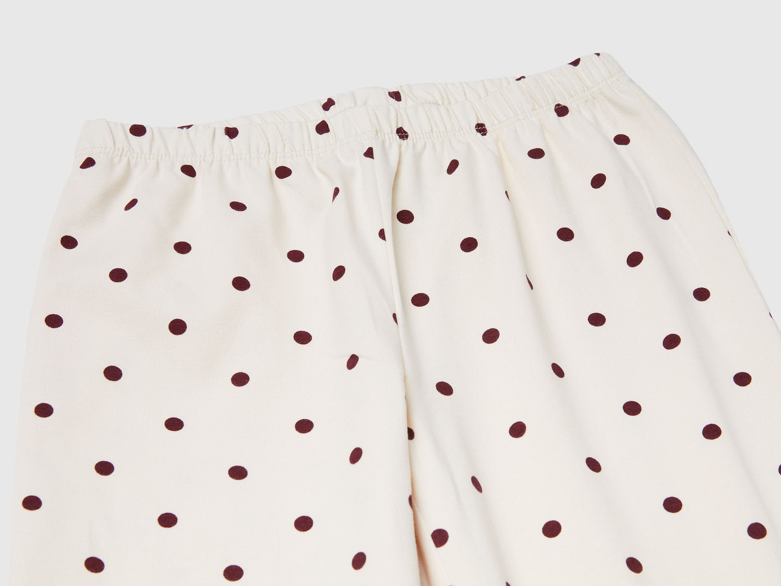 Caldo pigiama a pois da bambina bianco panna 3 | Benetton Outlet